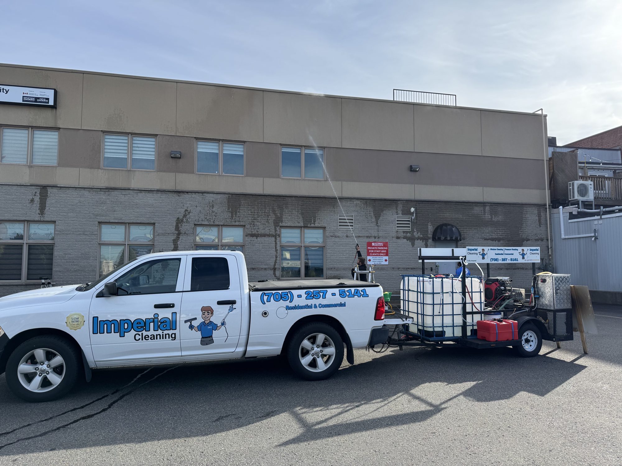 Imperial Cleaning branded service truck and professional exterior-cleaning equipment on the road in Sault Ste. Marie, Ontario