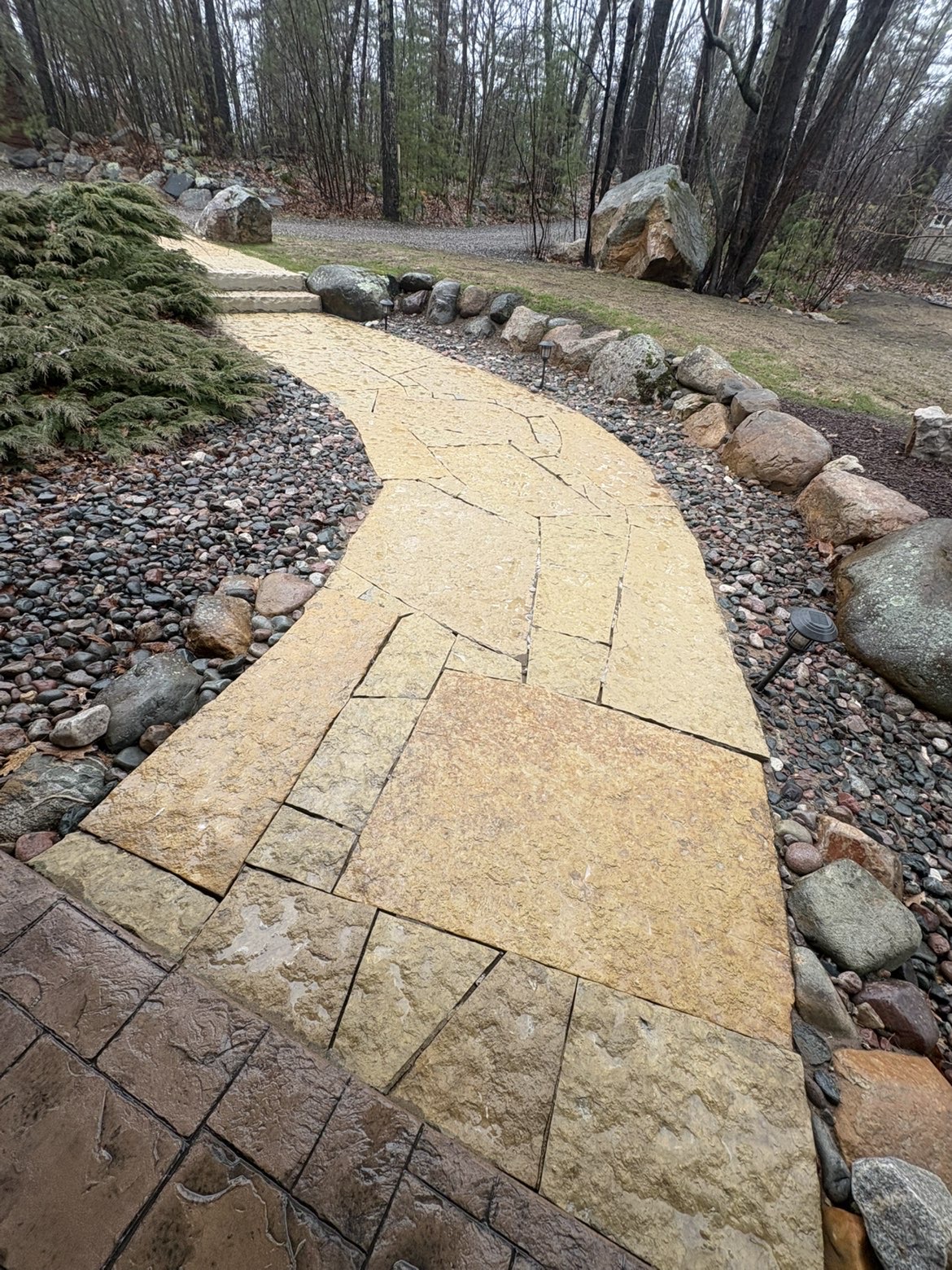 Freshly pressure-washed flagstone walkway in Sault Ste. Marie, Ontario